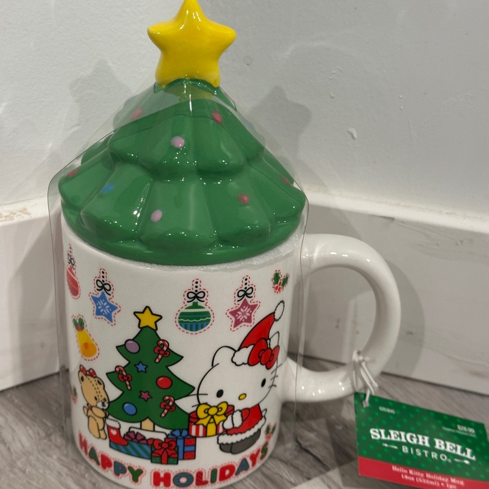 Hello Kitty Holiday Mug with Green and Yellow Star Lid
